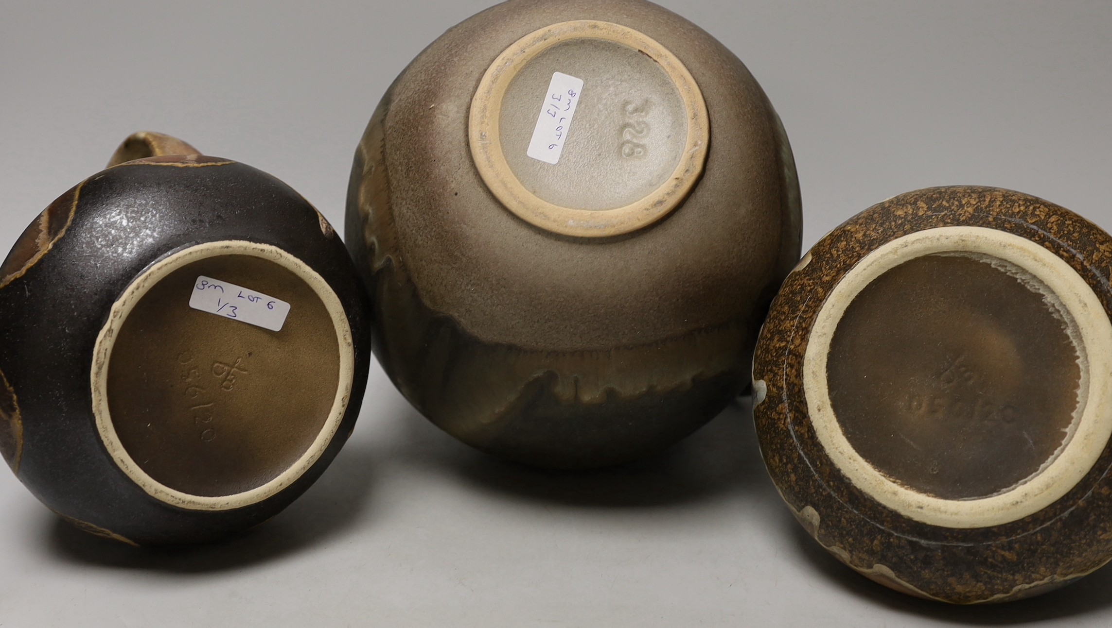 Three West German art pottery items; a pair of Dümler & Breiden, and a large ewer. Tallest 24cm